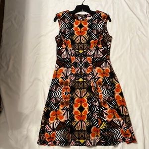 Very pretty butterfly dress.